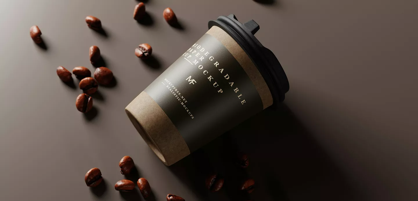 A minimalist, elegant coffee cup design with sophisticated typography on a matte finish cup, surrounded by coffee beans on a neutral background